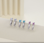 Load and play video in Gallery viewer, Video demonstration of sparkling moissanite hoop earrings in silver, highlighting design and features