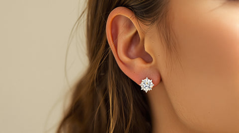 Woman wearing sparkling moissanite stud earrings, close-up styling shot