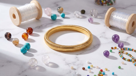 Elastic stretch cord and beads laid out on a table for making a stretch bracelet