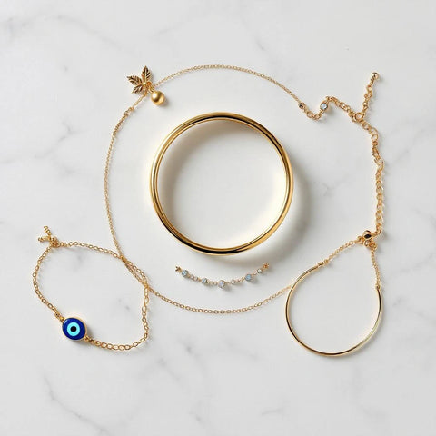 Collection of bracelet types on marble — complete bracelet guide