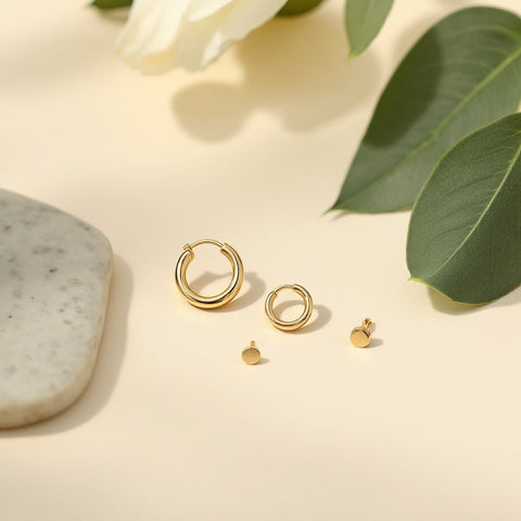 How to stack huggie earrings — curated ear arrangement with multiple huggie sizes and flat-back stud