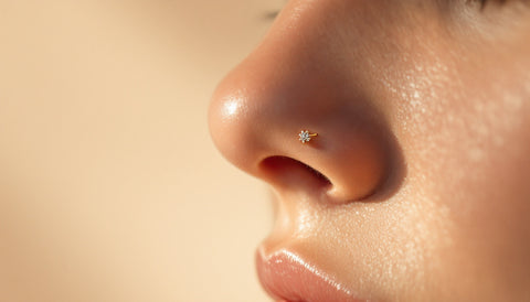 Close-up of a small nose stud illustrating hypoallergenic nose piercing jewelry materials