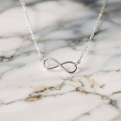 Infinity necklace meaning — sterling silver infinity symbol pendant symbolising eternal love