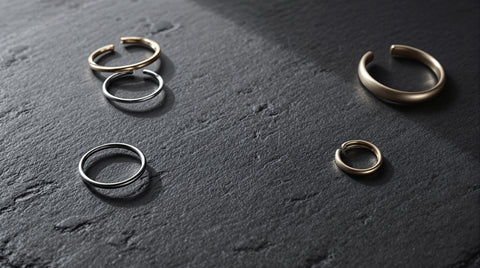 Assorted stainless steel style rings and hoop earrings for daily wear
