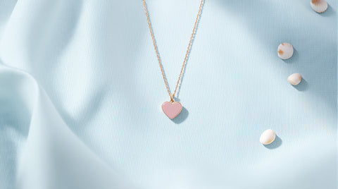 Delicate pink heart pendant necklace, coastal-inspired styling
