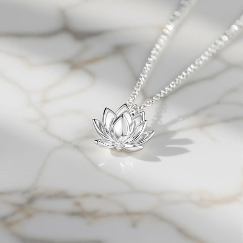 Lotus necklace meaning — silver lotus flower pendant symbolising spiritual growth and purity