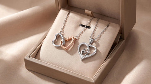 Interlocking Hearts Necklace and Mom Heart Necklace displayed together as a matching set