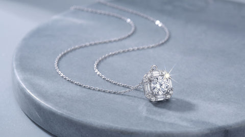 AJLuxe round brilliant CZ pendant necklace with a stone frame on grey stone