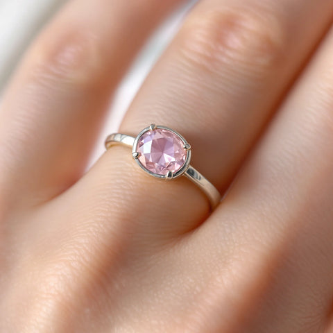 Mood ring showing pink color meaning — affection, warmth, romantic feelings