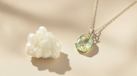 Pale green prasiolite crystal and quartz pendant necklace editorial photography