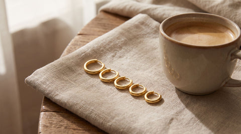 Gold huggie hoop earrings styled for a casual first date