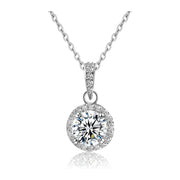 Round Halo Pendant Necklace — 1 carat cubic zirconia center stone, pave CZ halo, 316L stainless steel, rhodium plated, white background