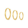 Thin sterling silver huggie earrings in 18K gold plating