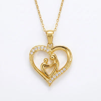 Mom Heart Necklace in 18K gold plated stainless steel, mother and child heart pendant with CZ pave stones, white background