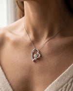 Load image into Gallery viewer, Soulmate Necklace worn at the collarbone, white-gold-tone finish
