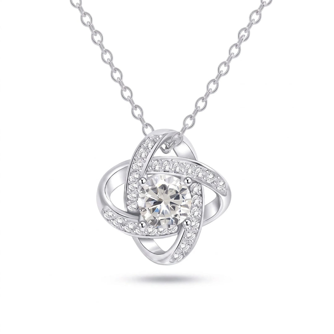 Love Knot Necklace — interlocking rings knot pendant with round CZ, rhodium plated finish, white background