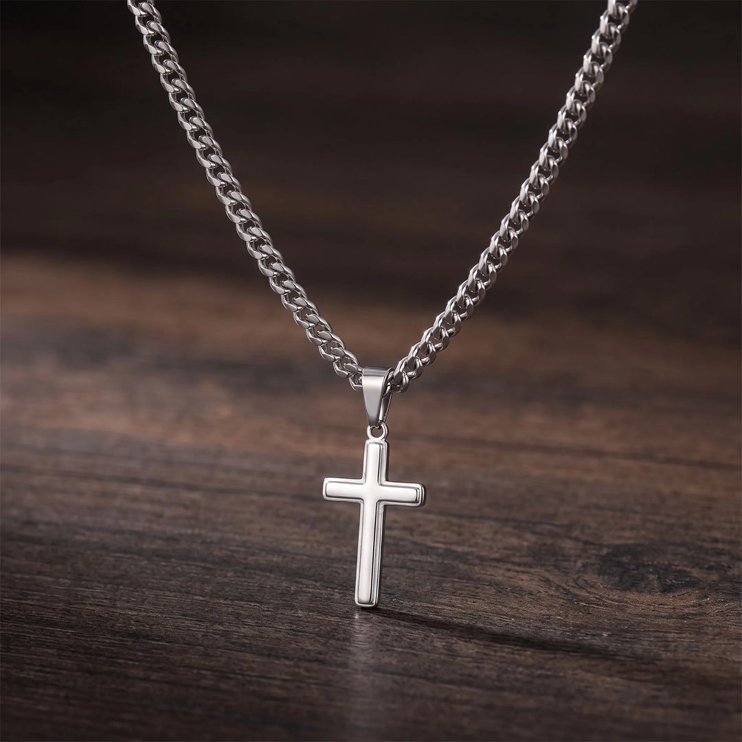 Polished 316L stainless steel cross pendant and Cuban link chain, close detail
