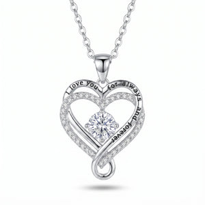 Love Knot Heart Necklace — silver-tone, white background