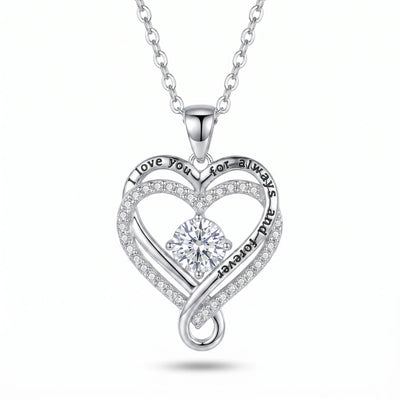 Love Knot Heart Necklace — silver-tone, white background