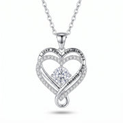 Love Knot Heart Necklace — silver-tone, white background