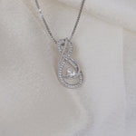 Load and play video in Gallery viewer, Clear Diamond Infinity Birthstone Necklace - April Gemstone
